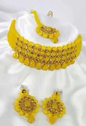 Alloy jewel set with yellow stone hangings | MANATH